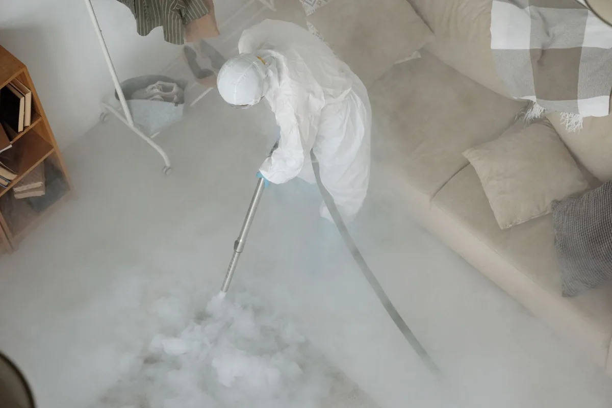Biohazard cleanup technician in protective equipment, Butler, NJ